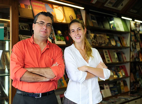 A man and woman stand in the small business book store