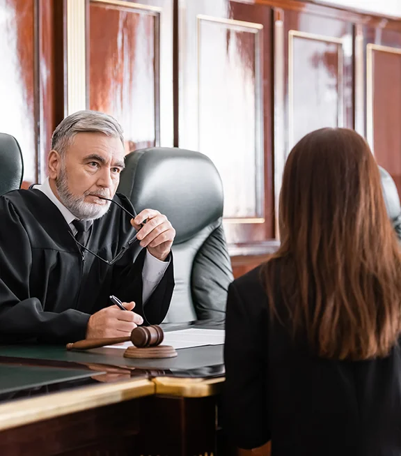 A judge listens during a probate hearing